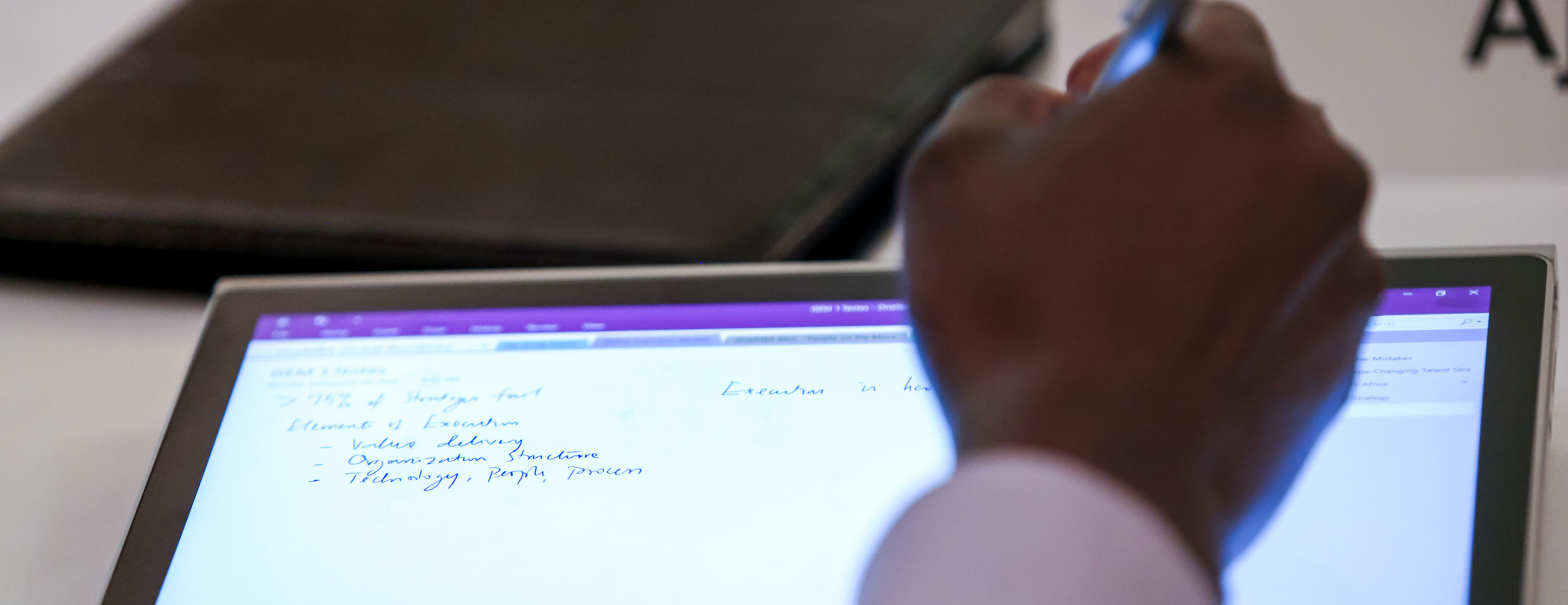 Weekend MBA student writing