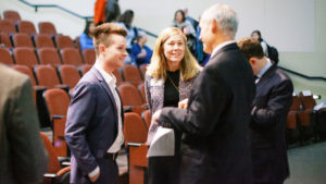 Graeme Strickland speaking with Dean Shackleford in Koury auditorium 