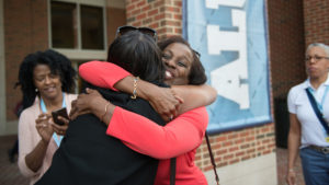 Two women hugging at the UNC Kenan-Flagler 2018 Alumni Reunion