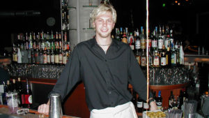 Mike Christian of UNC Kenan-Flagler Standing In Restaurant In 1990s