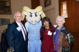 Coleman Ross (BSBA ’65) with Malarie Alexis (MAC ’23) and guest Nancy Jo Smith.