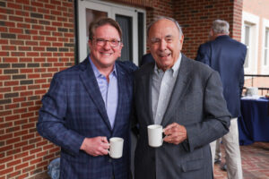 Jeff Tucker poses with former UNC Kenan-Flagler Dean Paul Fulton at the Bell Hall groundbreaking in September 2022.