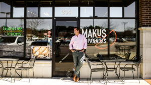 Hernan Moyano (MBA '02) at the Durham location of the business he co-founded, Makus Empanadas.