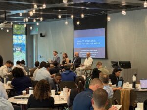 Raj Merchant (MBA ’20) speaks on an Impact Weekend panel.