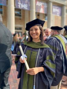 1)Maya Fitzgerald (PharmD, MBA ’26) poses with her diploma.