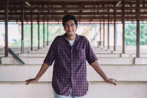 Samir Lakhani smiling at camera