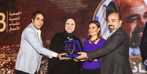 Ahmed Yehia (far right) accepting an award from the Egyptian Junior Business Association. Via Eco Nubia Facebook
