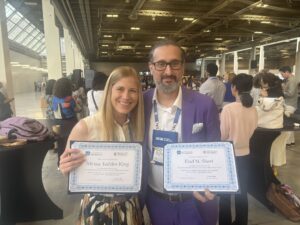 Alyssa Tedder-King (PhD ’25) with Professor Elad Sherf after winning the Academy of Management DEI Division’s 2025 Saroj Parasuraman Outstanding Publication Award.