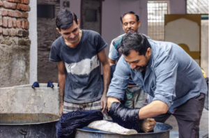 Founder Kunal Desai hand-dying yarns and collaborating with local natural dye producers. 
