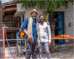 Kunal Desai with a local weaver in Kutch, Gujarat, India.