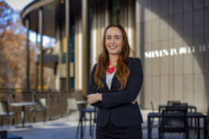 Paige Ouimet in front of Bell Hall.