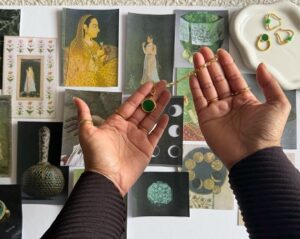 The Moon Swivel ring and necklace draw inspiration from Mughal-era art and jewelry. On one side, a lotus is engraved into emerald-toned, hand-treated jade; on the other, a lunar cycle engraving highlights the significance of the moon in Islam and the heritage carried in these motifs. 