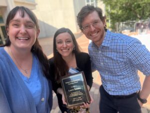 Professor Laura Sonday celebrates her teaching award win with her friends.