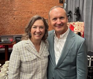 Dean Mary Margaret Frank (BSBA '92, MAC '92, PhD '99) with David Gardner (BA ’88) at Investicon