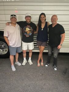 Chris Marquart (MAC '24) with Professors Chip and Tanja Snively after a show