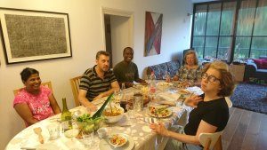 Student eating with family