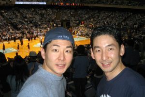 Kane Nakamura cheering on the Tar Heels with his brother