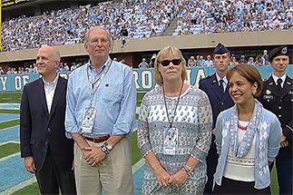 Steve and Debbie Vetter stand with Chancellor Folt celebrating their 40 million dollar campaign gift to UNC