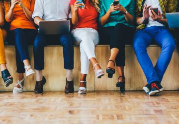 people on laptops and cellphones