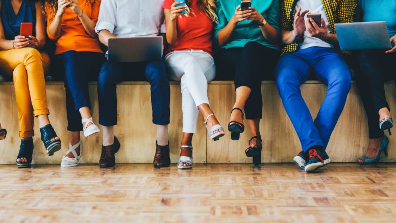 people on laptops and cellphones