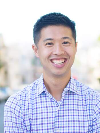 Alex Dea Standing on Road Smiling