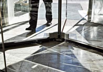 Man walking into an office building