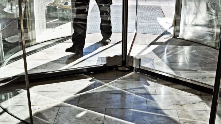 Man walking into an office building