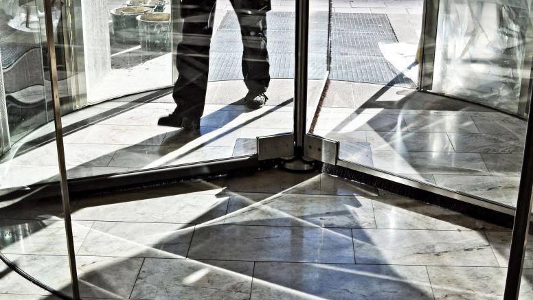 Man walking into an office building