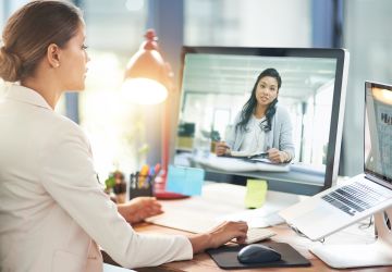 Business Woman Talking To Remote Employee