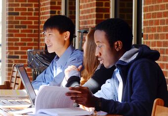 Students studying at a table