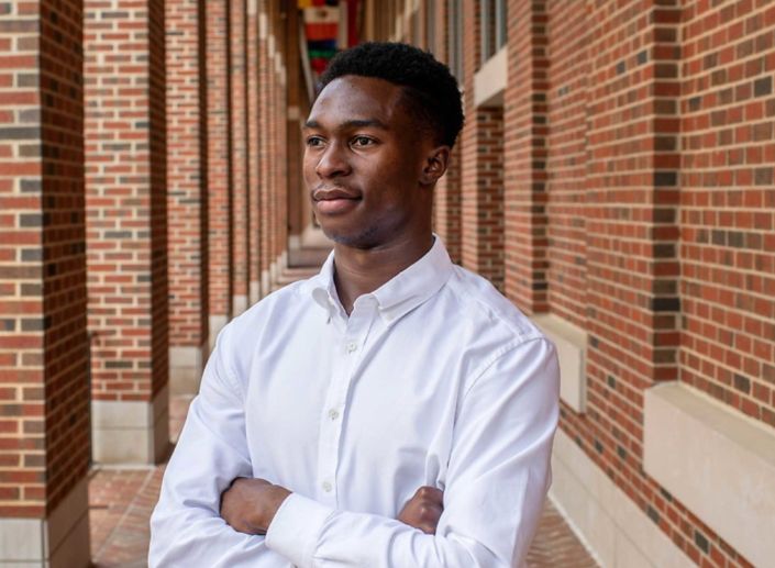 man with crossed arms