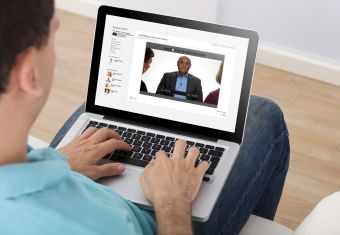 Man Using Laptop At Home