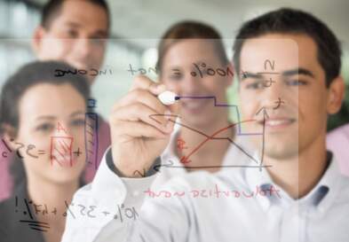 Man drawing on whiteboard