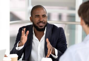 Man explaining at meeting