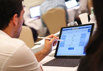 EMBA Students with analytics