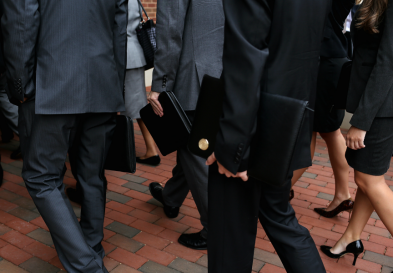People in suits walking