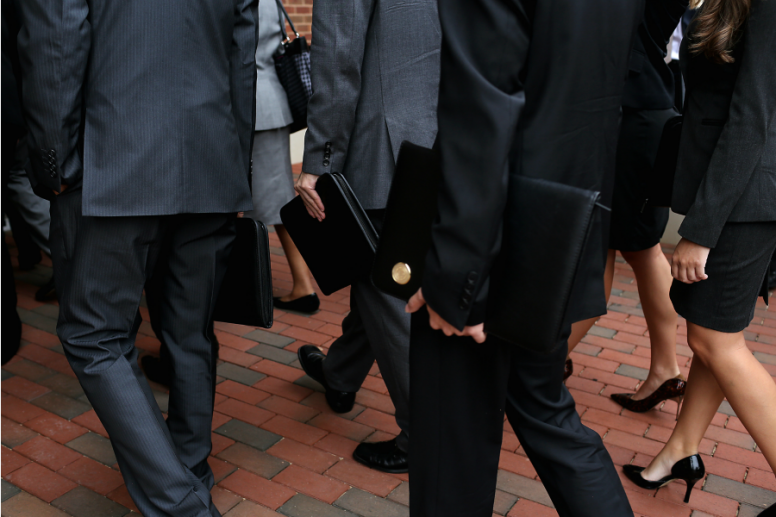 People in suits walking