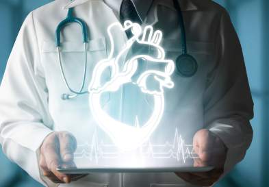 Doctor holding neon heart