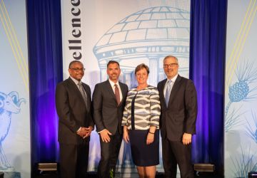 Lynn Lewis and Paul Grey Parker and James H. Johnson Jr. and N. Adam Brown at UNC Kenan-Flagler Hall of Fame 2019