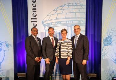 Lynn Lewis and Paul Grey Parker and James H. Johnson Jr. and N. Adam Brown at UNC Kenan-Flagler Hall of Fame 2019