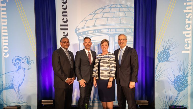 Lynn Lewis and Paul Grey Parker and James H. Johnson Jr. and N. Adam Brown at UNC Kenan-Flagler Hall of Fame 2019