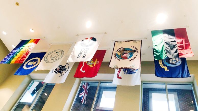 Diversity flags displayed at Kenan-Flagler Loudermilk Lobby