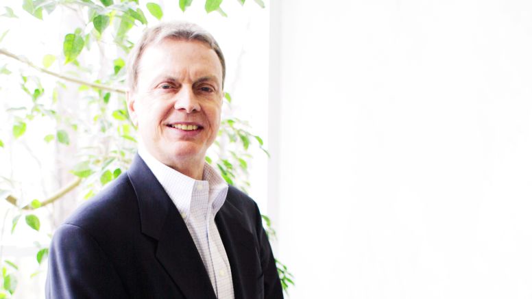 Steve Cumbie Standing In UNC Kenan-Flagler Hall