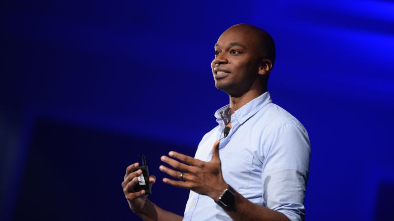 Stage background Khalil Smith speaks at event