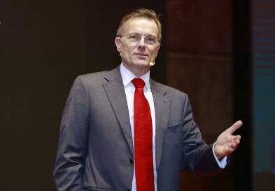 Speaking On Stage JB Steenkamp Of UNC Kenan-Flagler