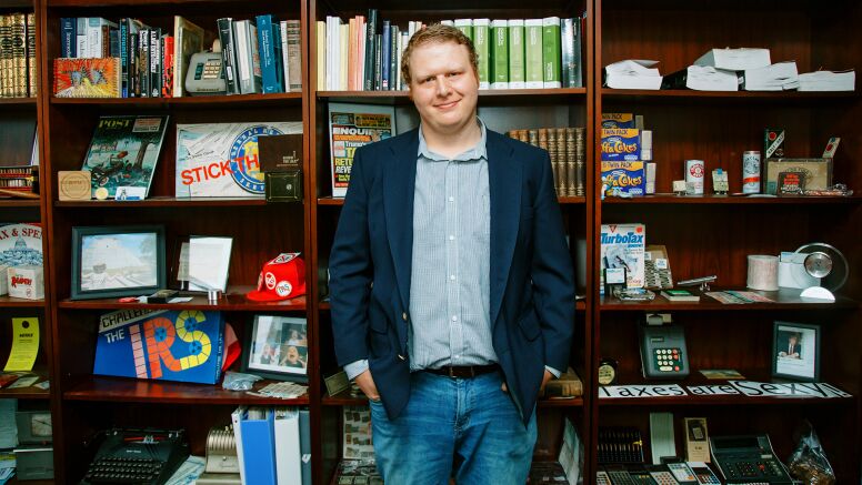 Professor Jeff Hoopes with IRS Tax collecction in UNC Kenan-Flagler Office