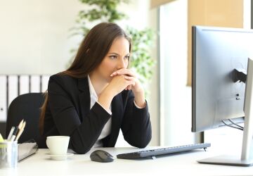 Woman at Desk Thinking