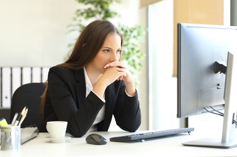Woman at Desk Thinking
