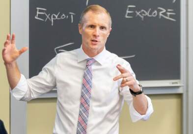 UNC professor Chris Bingham giving a presentation.