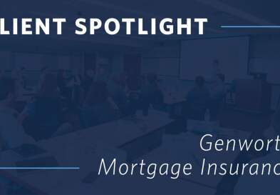 A graphic showing the words “Client Spotlight: Genworth Mortgage Insurance” overlaid on an image of businesspeople seated at a conference table during a presentation.
